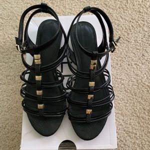 ALDO BLACK AND GOLD SANDALS